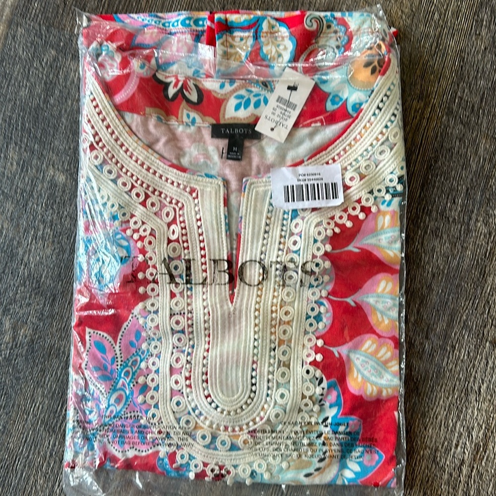 Three-quarter sleeve Talbots multicolor top with crochet stitching.